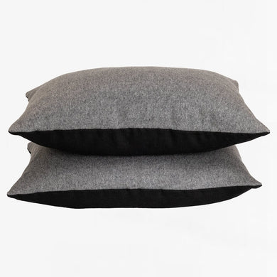 grey flannel and black linen pillows