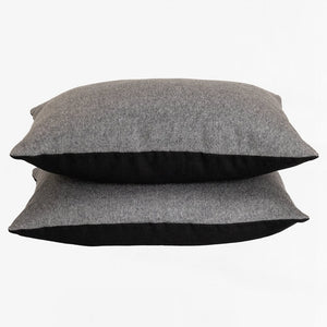 grey flannel and black linen pillows