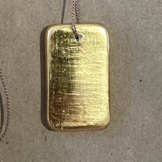 Carol Leskanic 23 karat gold dog tag necklace